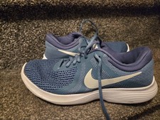 Pair Of Mens Nike Revolution 4